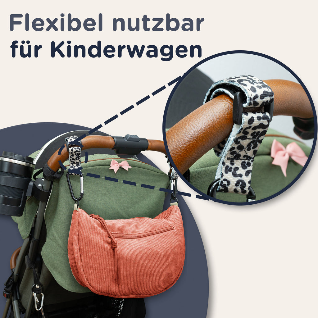 Braune Moonbag XL Wickeltasche am Kinderwagen befestigt