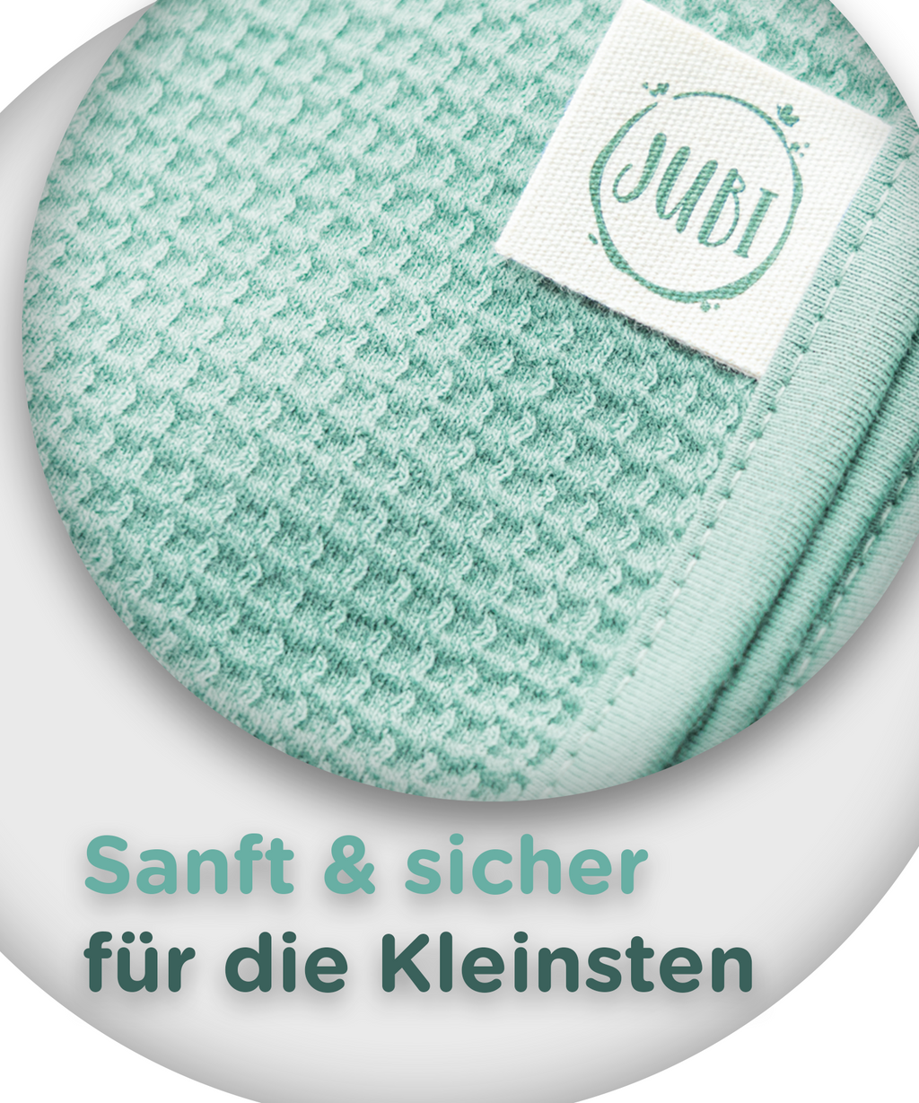 Hochwertige Baumwolle der Jubi Babydecke im Detail mint
